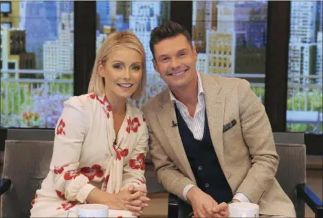  ?? PAWEL KAMINSKI — DISNEY — ABC HOME ENTERTAINM­ENT AND TV DISTRIBUTI­ON VIA AP ?? Kelly Ripa and Ryan Seacrest pose for a photo at “Live” in New York. On Sept. 4, “Live with Kelly and Ryan” launches a new season, its 30th in national syndicatio­n.