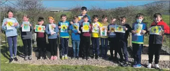  ?? ?? The P4-7 Drumlemble pupils with their colourful artwork.