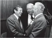  ?? TENNESSEAN ?? U.S. Sen. Howard Baker, left, and Sheriff Fate Thomas and Police Lt. Charles E. “Goose” Warren at the March 2, 1978 for the 24th annual Sure Shot Rabbit Hunters Associatio­n supper. JIMMY ELLIS / THE
