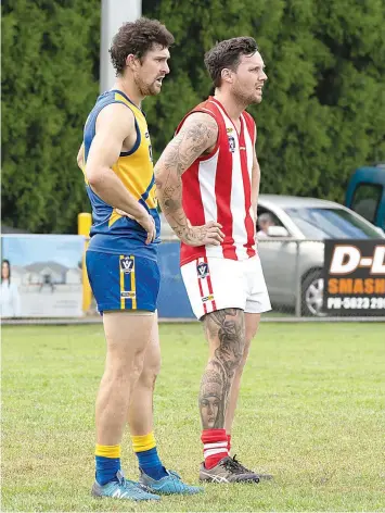  ?? ?? Ellinbank’s Andrew Quirk and Trafalgar’s Damian Mann watch the play unforld.