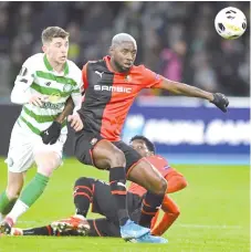  ?? - AFP photo ?? Celtic midfielder Ryan Christie (L) will be banned for three games after being punished for a crotch grab on Rangers' Alfredo Morelos.