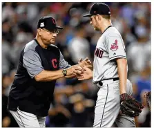  ?? BEN SOLOMON / THE NEW YORK TIMES ?? Indians manager Terry Francona pulls pitcher Trevor Bauer in Game 4 of the AL Division Series after giving up four runs (none earned) on four hits and two walks in 1⅔ innings.