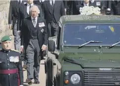  ?? PHOTO: GETTY ?? Prince Charles walks alongside the hearse.