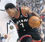  ?? NATHAN DENETTE THE CANADIAN PRESS ?? Kyle Lowry and the Raptors ran into trouble against Nikola Jokic, who finished with a triple-double, and the Nuggets at Scotiabank Arena on Monday night.