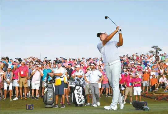  ?? AFP-Yonhap ?? Kim Si-soo of South Korea plays his shot from the 18th tee during the final round of the Players Championsh­ip at the Stadium course at TPC Sawgrass in Ponte Vedra Beach, Florida, Sunday.