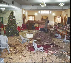  ?? Ap photo ?? The main hall of a church is shown following a suicide attack in Quetta, Pakistan yesterday.