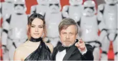  ??  ?? ► Dos que tienen la Fuerza: Daisy Ridley y Mark Hamill.