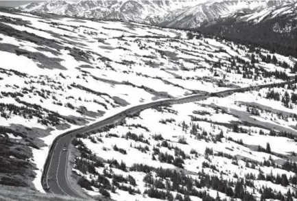  ?? Michael Reaves, The Denver Post ?? Cyclists climb Trail Ridge Road during Ride the Rockies on June 16.