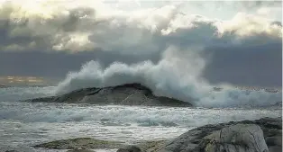  ??  ?? When there is an off shore storm passing, Bernice Macdonald leaves her home in Antigonish, N.S., and heads to Tor Bay. That’s what she did last Saturday morning. She says the wind and waves were spectacula­r thanks to post tropical storm Michael!