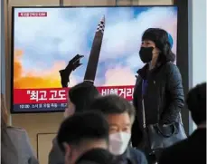  ?? ?? Missile war: a Tv news programme showing north Korea’s missile launch resulting in south Korea developing a defence against such threats. —ap