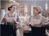  ?? FOCUS FEATURES BEN BLACKALL/ ?? Sophie McShera, left, as Daisy and Lesley Nicol as Mrs. Patmore in “Downton Abbey: A New Era.”