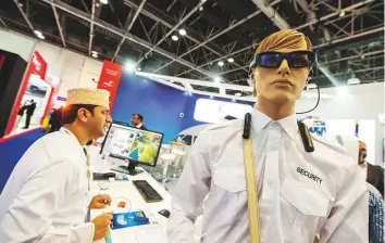  ?? Virendra Saklani/Gulf News ?? A visitor seeking informatio­n about security glasses for face recognitio­n at the Vision Labs stall at Intersec exhibition at Dubai World Trade Centre yesterday.