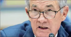  ?? Stefani Reynolds / Getty Images ?? Jerome Powell, chairman of the Federal Reserve, said the economy’s recovery could stall without further stimulus aid from the federal government.