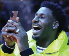  ?? RICK BOWMER — THE ASSOCIATED PRESS ?? Memphis Grizzlies’ Jaren Jackson Jr. watches an NBA Rising Stars semifinal game on Friday. The former Michigan State star is making his NBA All-Star Game debut today.