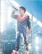  ?? Robert Gauthier Los Angeles Times ?? BRUNO MARS performing at the Grammys in February at Staples. The show is in New York next year.