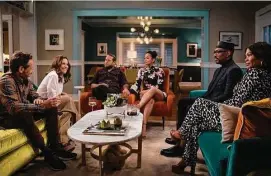  ?? Parrish Lewis/Associated Press ?? This image released by Netflix shows, from left, David Duchovny, Julia Louis-Dreyfus, Jonah Hill, Lauren London, Eddie Murphy and Nia Long in a scene from “You People.”