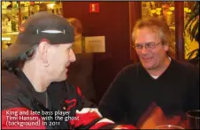  ?? ?? King and late bass player Timi Hansen, with the ghost (background) in 2011