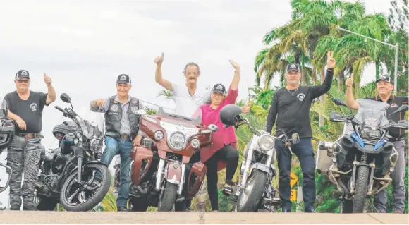  ?? ?? Mick Wilson, Stryka, Lothar Stull, Astrid Stull, The General, and Shane Klein prepare for the Black Dog Ride. Picture: Glenn Campbell