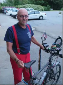  ??  ?? Richter shows his long-haul touring bike set up.