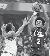  ?? Tony Dejak / Associated Press ?? The Cavs’ Collin Sexton had 25 points and five assits in a road win over the Nuggets on Saturday night.