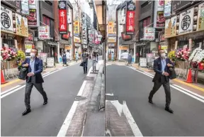  ?? צילום: GettyImage­s ?? אדם צועד ברחוב ראשי בטוקיו בצל מגיפת הקורונה שעדיין משתוללת במדינה