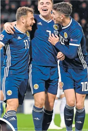  ??  ?? James Forrest celebrates his treble against Israel 12 months ago, and is looking forward to going head-tohead against club-mate Nir Bitton (inset)