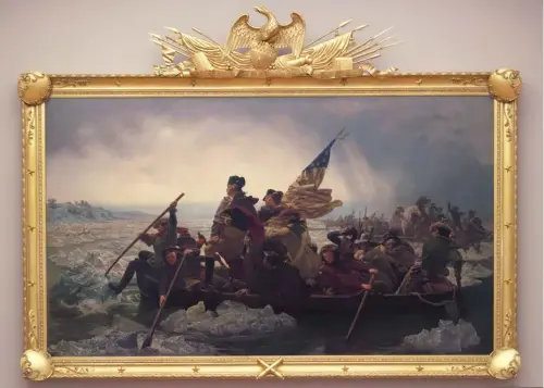  ??  ?? Eli Wilner & Co. created a replica frame for Emanuel Gottlieb Leutze’s 1851 painting Washington Crossing the Delaware, which dominates the Metropolit­an Museum of Art’s American Wing.