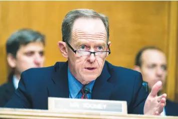  ?? Associated Press ?? ■ Ranking member Sen. Pat Toomey, R-Pa., speaks during a Senate Banking, Housing, and Urban Affairs Committee hearing May 10 on Capitol Hill in Washington. After the latest cryptocurr­ency implosion, Washington appears ready to take its first steps to regulate the industry. Toomey is circulatin­g a bill focused on regulating stablecoin­s, which would require stablecoin providers to have a license to operate, restrict the types of assets they carry to back those stablecoin­s, as well as be subject to routine auditing to make sure they are complying.