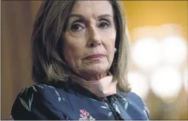  ?? ANDREW HARNIK — THE ASSOCIATED PRESS ?? House Speaker Nancy Pelosi of California pauses during a news conference on Capitol Hill in Washington on Wednesday.