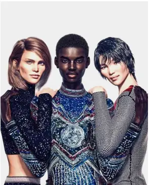  ??  ?? Digital models Margot, Shudu and Zhi and have re-ignited a debate about diversity in the fashion world. — Balmain
