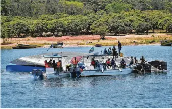  ?? Associated Press ?? Tanzania President John Magufuli ordered the arrests of those responsibl­e for overturnin­g a ferry and announced four days of national mourning during a televised address late Friday.