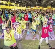  ??  ?? Digital Vibez’s Fitness Jams and Fitness Fiestas encourage parents and children to get exercise by combining technology arts enrichment programs with music and dance.