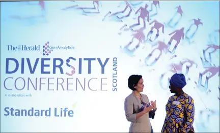  ??  ?? „ Event host Rachel Mctavish, left, and Pheona Matovu, of Radiant and Brighter, take part in the inaugural The Herald Diversity Conference in associatio­n with Standard Life held at the Radisson Blu Hotel in Glasgow last year.