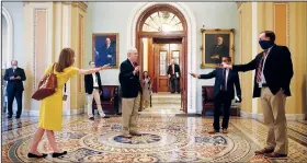  ?? (AP/Patrick Semansky) ?? Senate Majority Leader Mitch McConnell speaks with reporters at a distance Thursday outside the Senate chamber.