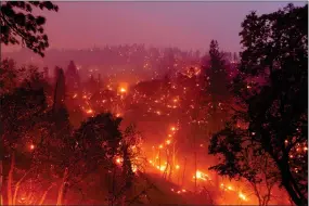  ?? AP PHOTO BY NOAH BERGER ?? The French Fire burns hillsides along Highway 155 in Sequoia National Forest, Calif., on Wednesday, Aug. 25.