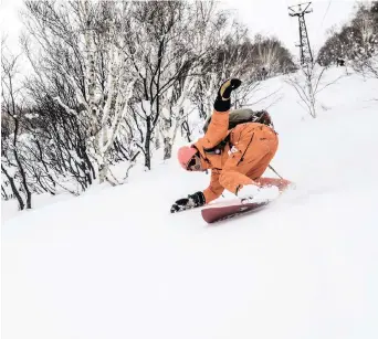  ??  ?? WHITE WORLD: A rider glides down a slope at a Yuki Ita event on the island of Hokkaido in Japan.