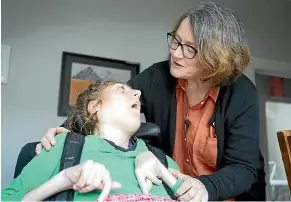  ?? ROSS GIBLIN/STUFF ?? Elizabeth Goodwin with her daughter, Jessica. Elizabeth won the Support Superstar Award, a recognitio­n of her online community.