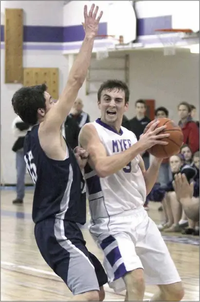  ?? MIKE DIBATTISTA Niagara Falls Review ?? A.N. Myer’s Jack Daneyko prepares to power to the hoop during Thursday’s Zone 3 senior boys AAA basketball final. Myer won 64-62 and advance to SOSSA next week.