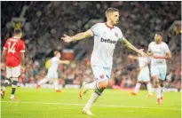  ?? Photo / AP ?? Manuel Lanzini celebrates after scoring the only goal of the game.