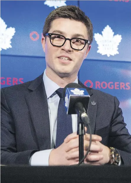  ?? CHRIS YOUNG/THE CANADIAN PRESS ?? Kyle Dubas speaks at a press conference as he’s introduced as the new general manager of the Maple Leafs in Toronto on Friday. The 31-year-old signed a five-year deal with the team.