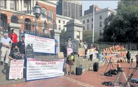  ?? MATT MURPHY / SHNS ?? Tenants and community groups focused on preventing evictions during the COVID-19 pandemic rallied outside the Statehouse Wednesday for a bill that would halt evictions and rent increases for a year after the end of the public health emergency.