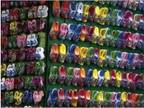  ??  ?? Wooden clogs are a symbol of Holland. Several decorative items are made of the popular and colorful wooden shoes.
