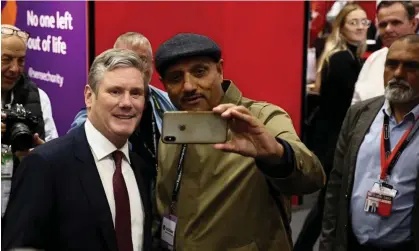  ?? Photograph: Henry Nicholls/Reuters ?? Keir Starmer with conference delegates in Liverpool on 28 September.