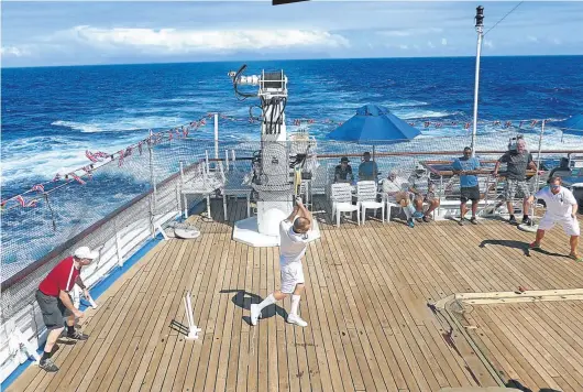  ?? Pictures: Jono Waters ?? IT’S ALL OVER A game of shipboard cricket in full swing out in the South Atlantic.