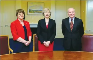  ?? (Charles McQuillan/Reuters) ?? BRITAIN’S PRIME Minister Theresa May (center), Northern Ireland first minister Arlene Foster, and deputy first minister Martin McGuinness pose at Stormont Castle in Belfast, Northern Ireland, yesterday.