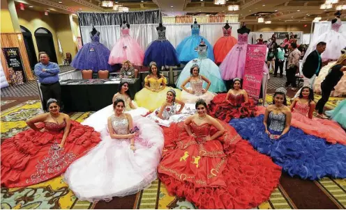  ?? Annie Mulligan photos ?? Quinceañer­a dresses can cost thousands of dollars, just one of the big-ticket expenses for the coming-of-age parties for 15-year-olds.