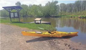  ?? MILWAUKEE JOURNAL SENTINEL CHELSEY LEWIS/ ?? A landing off Green Head Road west of Mayville provides a spot for launching a kayak or other boat onto the Rock River in the Horicon Marsh.