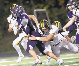  ??  ?? Northweste­rn’s Justin Holmes tackles Salisbury’s Chad Parton.