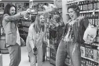  ?? MICHELE K. SHORT/STX PRODUCTION­S VIA AP ?? Mila Kunis, from left, Kristen Bell and Kathryn Hahn appear in a scene from “Bad Moms.”