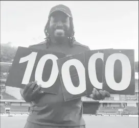  ??  ?? Chris Gayle celebrates passing 10,000 runs in Limited Overs cricket.